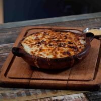 Pastisio Viande Hachée Viande hachée, sauce béchamel, fromage.